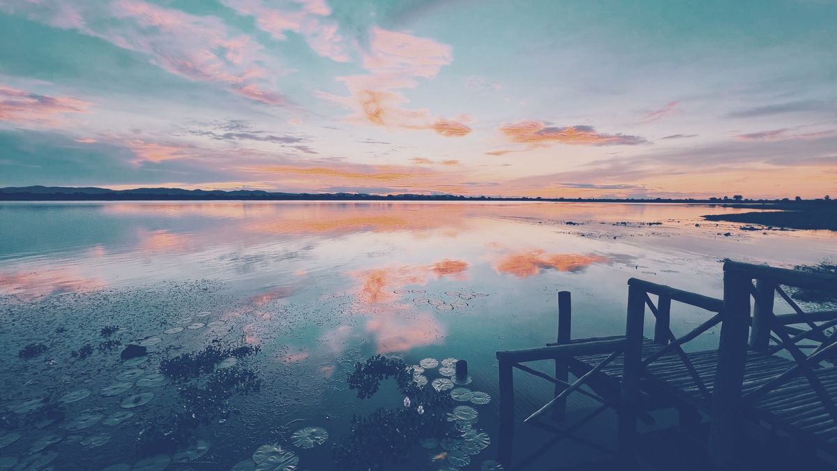 Sunrise over water in Zambia